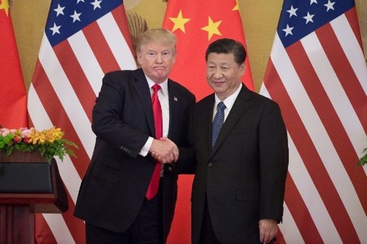 Presiden AS Donald Trump dan Presiden China Xi Jinping bertemu di Balai Agung Rakyat China di Beijing, Kamis (9/11/2017). (AFP/Nicolas Asfouri via kompas.com)