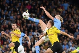 Erling Haaland mencetak gol tak terduga ke gawang Borussia Dortmund| Dok GETTY IMAGES via AFP/MICHAEL REGAN via Kompas.com