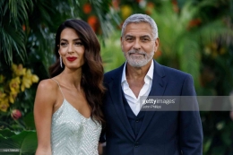 George Clooney dan istrinya, Amal. (John Phillips/Getty Images for Universal)
