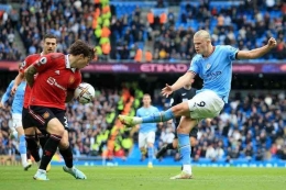 Erling Haaland menjadi bintang dalam derby Manchester 2022 (Foto AFP/Lindsay Parnaby via Kompas.com). 