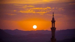sunset-desert-with-muslim-mosque-foreground. Image by nikitabuida on freepik.com