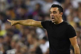Xavi Hernandez, pelatih Barcelona. Foto: AFP/Pau Barrena via Kompas.com