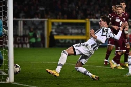 Dusan Vlahovic mencetak gol kemenangan Juventus. Foto: Marco Bertorello/AFP/kompas.com
