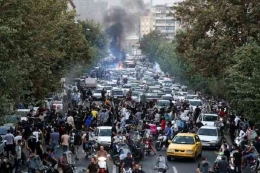 Kerusuhan telah menyebar di beberapa kota besar dan kecil di Iran. (Mirror.co.uk/Anadolu Agency via Pikiran Rakyat)