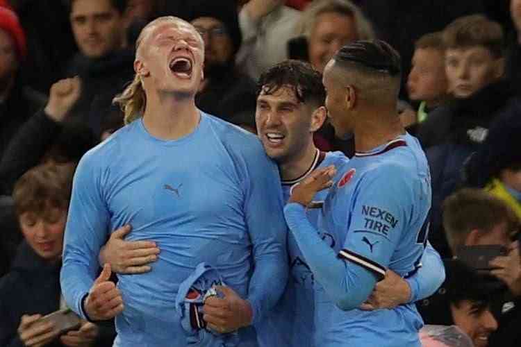 Erling Haaland merayakan gol kemenangan Manchester City. Foto: Adrian Dennis/AFP/kompas.com
