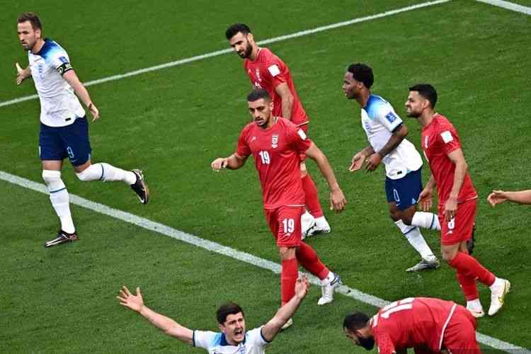 Inggris vs Iran di Piala Dunia 2022. (AFP/ANNE-CHRISTINE POUJOULAT dipublikasikan kompas.com)