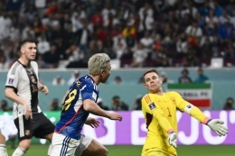 Pemain Jepang, Takuma Asano, merayakan keberhasilannya mencetak gol ke gawang Jerman dalam matchday pertama babak penyisihan grup Piala Dunia 2022 pada Rabu (23/11/2022) malam WIB. (Photo by Jewel SAMAD / AFP)(JEWEL SAMAD)