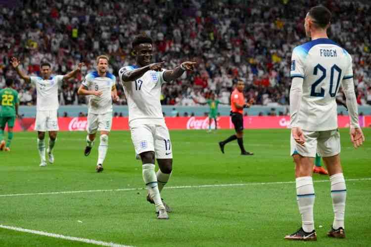 Inggris merayakan gol ke gawang Senegal di babak 16 besar piala dunia 2022. Foto: AFP/Paul Ellis via Kompas.com