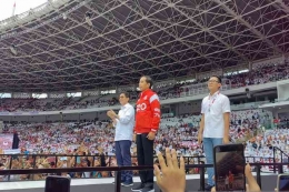 Presiden Joko Widodo menghadiri acara Nusantara Bersatu di Stadion Gelora Bung Karno (GBK), Sabtu (26/11). | Antara/Muhammad Zulfikar