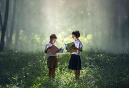 Ilustrasi dua orang anak yang sedang belajar (sumber: lipi.go.id)