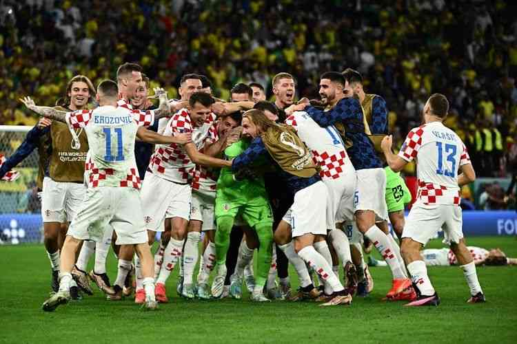 Kegembiraan Kroasia saat menang adu penalti kontra Brasil. Foto: AFP/Jewel Samad via Kompas.com