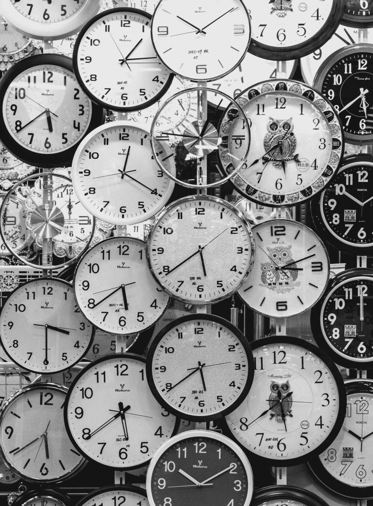 Photo by Andrey Grushnikov: https://www.pexels.com/photo/black-and-white-photo-of-clocks-707676/ Image caption