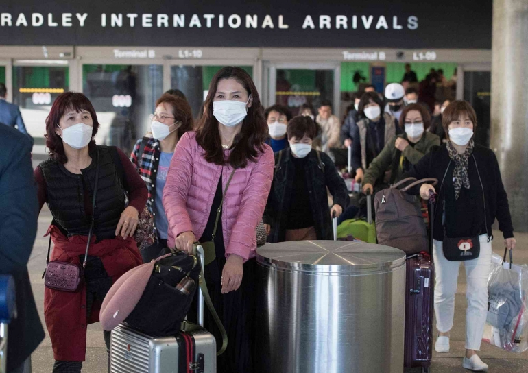 Wisatawan China di AS. Sumber: Mark Ralston/AFP/Getty Image/www.cfr.org