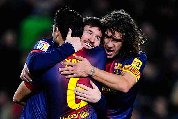Carles Puyol ketika bersama Messi dan Xavi di Barcelona (getty images.pt/fotos/Carles Puyol)