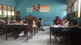 Ilustrasi: Murid belajar di kelas. (Foto: Dokumen pribadi) 