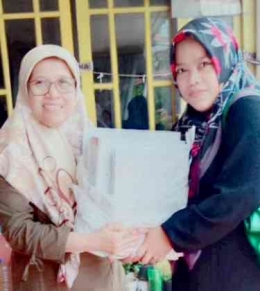 Foto : Penerimaan Buku Modul & 9 Pilar Sekolah Mitra IHF |dokpri Hana Marita Sofianti