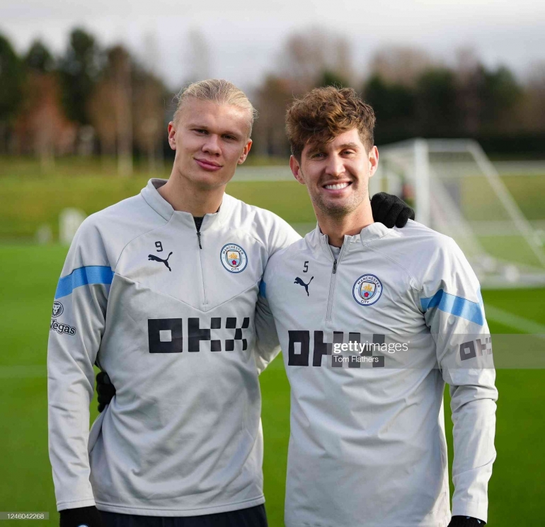 Erling Haaland-left and John Stones-right (Photo by Tom Flathers/Manchester City FC via Getty Images) 