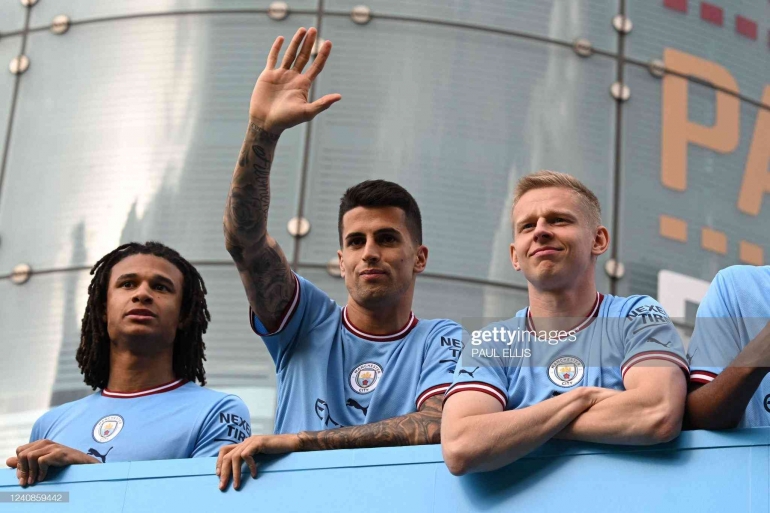 Ake, Cancelo-Mid, and Zinchenko were in bus parade as part of Premier League Champion commemoration (Photo by PAUL ELLIS/AFP via Getty Images) 