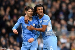 Stones-left and Ake-right celebrated a goal (Photo by Clive Mason via Getty Images)