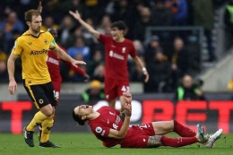 Liverpool menderita kekalahan dari Wolves 0-3.| Foto: AFP/Darren Staples via Kompas.com