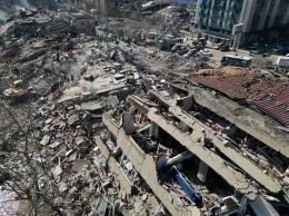 Potret bangunan di Turki rata dengan tanah usai diguncang gempa kuat pada 6 Februari (Reuters/Stoyan Nenov) 