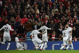 Para pemain Real Madrid merayakan kemenangan atas Liverpool (Sumber: kompas.com)
