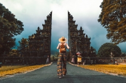 Ilustrasi wisatawan di Bali.(shutterstock.com/Davide+Angelini)