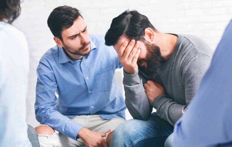 sad man comforted by his friend | theblanchardinstitute.com