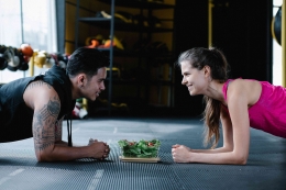 Photo by Annushka  Ahuja: https://www.pexels.com/photo/man-and-woman-at-the-gym-doing-planks-while-looking-at-each-other-and-smiling-7991915/ 