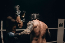 Photo by cottonbro studio: https://www.pexels.com/photo/man-in-black-boxing-gloves-4761598/ 