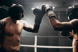 Photo by cottonbro studio: https://www.pexels.com/photo/man-in-black-boxing-gloves-4761658/ 