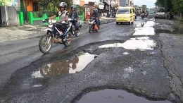 pembangunan jalan yang rusak (hukumonline)