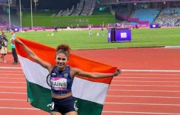 Pelari India Harmilan Bains merayakan kemenangannya di Asian Games 2023. | Sumber: india.posten.com