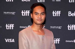 Sutradara Wregas Bhanuteja di Toronto International Film Festival di Scotiabank Theatre, 09/09/2023. (Sumber: AFP/MATHEW TSANG via kompas.com)
