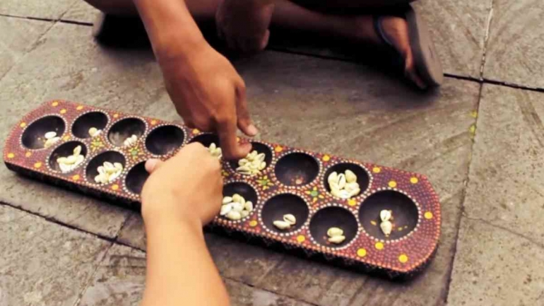 Mengupas Makna dan Keindahan di Balik Permainan Tradisional Congklak