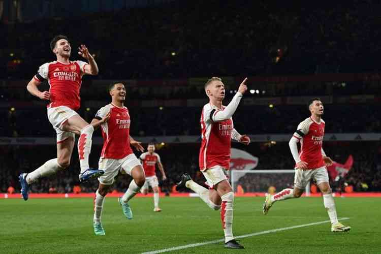Arsenal menang 1-0 atas Brentford untuk menggeser City dari puncak klasemen (Foto AFP/Glyn Kirk via Kompas.com).  