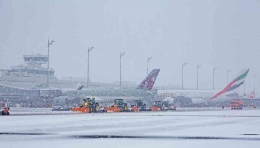 Ilustrasi bandara Munich yang tertutup salju | foto: munich-airport.de