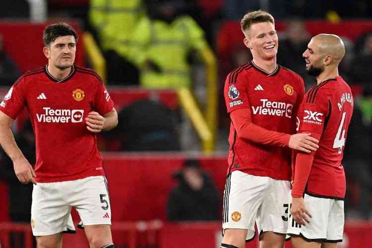 Pemain-pemain Manchester United meluapkan kegembiraan usai mengalahkan Chelsea di Liga Inggris. (Dok AFP/Oli Scarff via Kompas.com)
