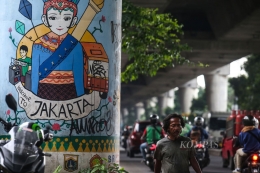 ilustrasi: Mural tentang Jakarta tergambar di kawasan Kemang, Jakarta, Jumat (21/1/2022). (Foto: KOMPAS/HENDRA A SETYAWAN)