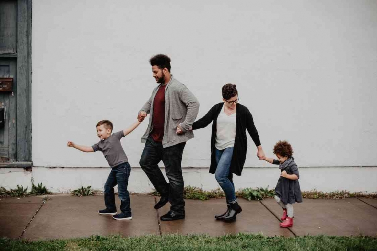 Photo by Emma Bauso from Pexels: https://www.pexels.com/photo/family-of-four-walking-at-the-street-2253879/