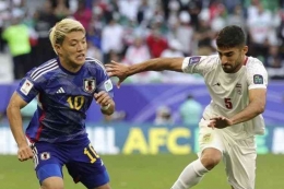Iran vs Jepang. (Giuseppe cacace/afp dipublikasikan kompas.com)