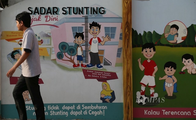 Kampanye kesadaran terhadap penanganan anak balita yang mengalami tubuh pendek (stunting) terlihat di kawasan Pondok Pinang, Jakarta, Rabu (17/4/2019). (KOMPAS/HENDRA A SETYAWAN)