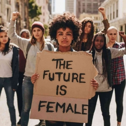 https://www.alamy.com/protesters-hold-up-signs-of-the-future-is-female-group-of-female-protesting-outdoors-for-women-empowerment-image225102350.html