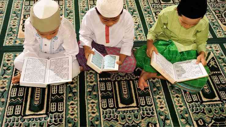 Membaca Al Qur'an, sumber gambar: Liputan 6.com