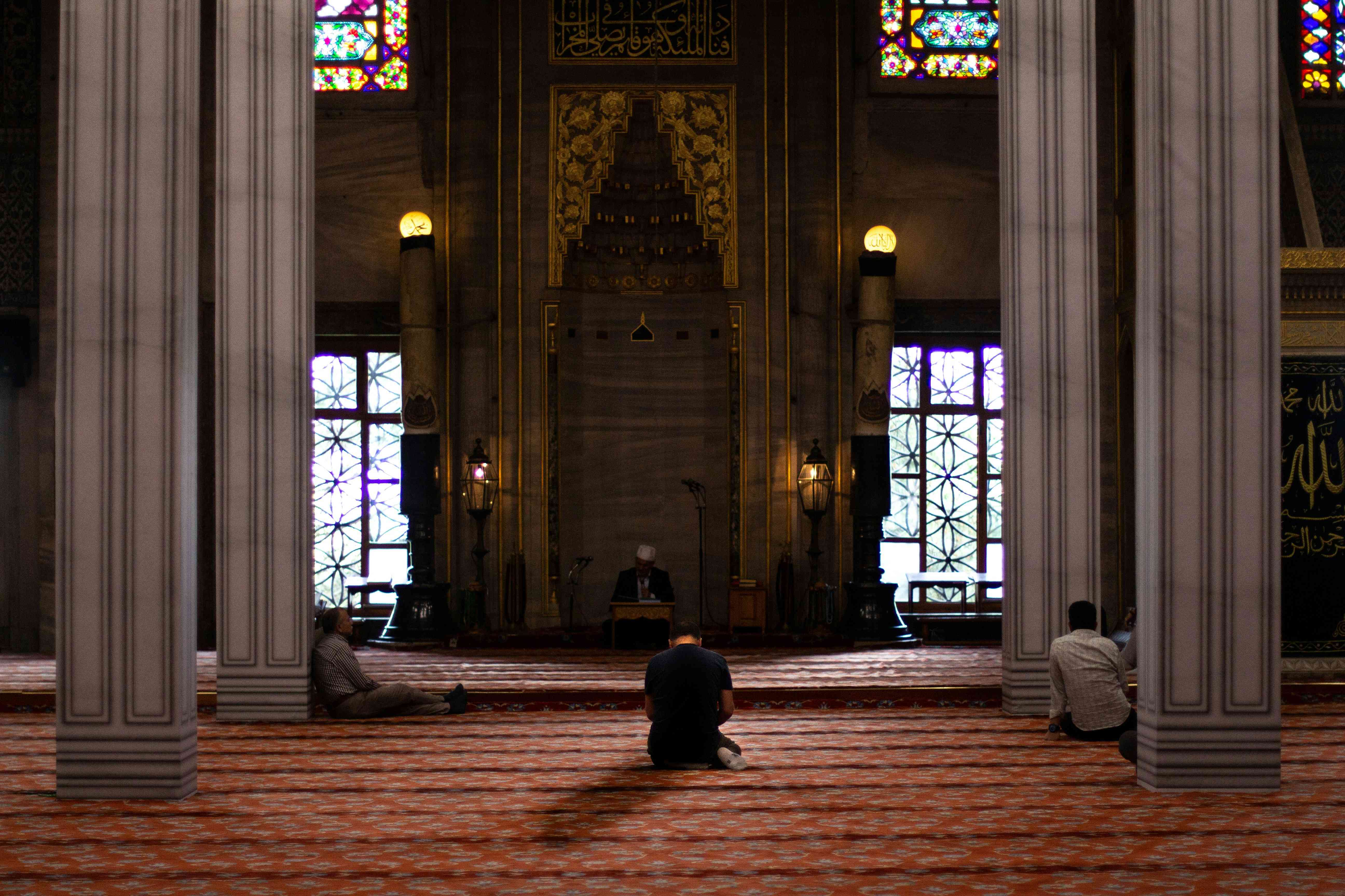 https://unsplash.com/photos/three-men-sitting-inside-mosque-8vyCtLPlEBo