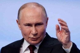 Vladimir Putin menang mutlak dalam pilpres yang baru saja usai. (Foto: Maxim Shemetov/Reuters.)