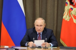 Vladimir Putin kembali terpilih sebagai presiden di pemilu Rusia.(Sputnik Kremlin/Mikhail Metzel via AP)