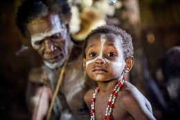 Suku Asmat di Papua DOK. Shutterstock/Sergey Uryadnikov(Shutterstock/Sergey Uryadnikov) - https://www.kompas.com/stori/read/2022/03/18/160000579/suku-