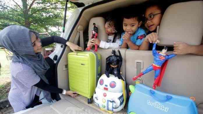 Anak-anak selalu membawa keseruan dalam perjalanan dengan mobil (Sumber: Tribunnews.com)