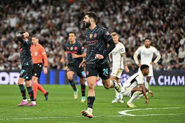 Manchester City ditahan imbang Real Madrid (3-3) dalam babak perempat final Liga Champions Eropa. Foto: AFP/Javier Soriano via Kompas.com